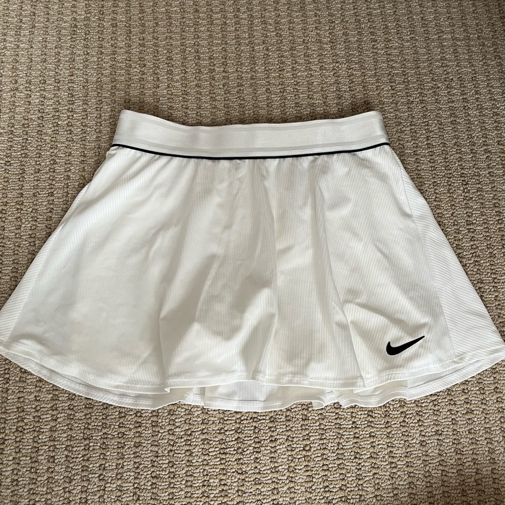 cute white nike tennis skirt! Dri-fit, never worn! Size small.